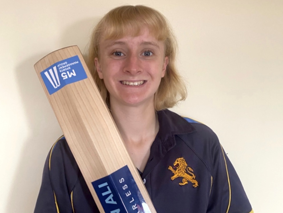 Ellie Bishop shows off the Moeen Ali bat awarded to her by Devon CCC for her significant contribution to cricket in 2023<br>credit: Contributed