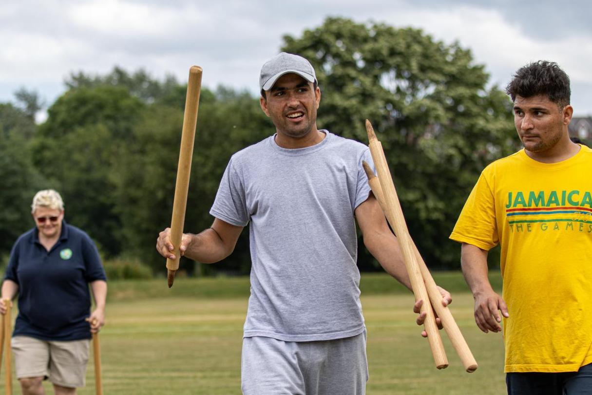 New players like Awrangzeb (centre) often help Exwick CC out with the ground.