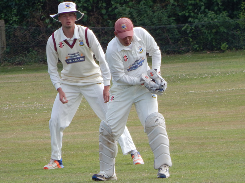 Torquay's Justin Yau in action behind the stumps against Bradninch<br>credit: Steve Birley