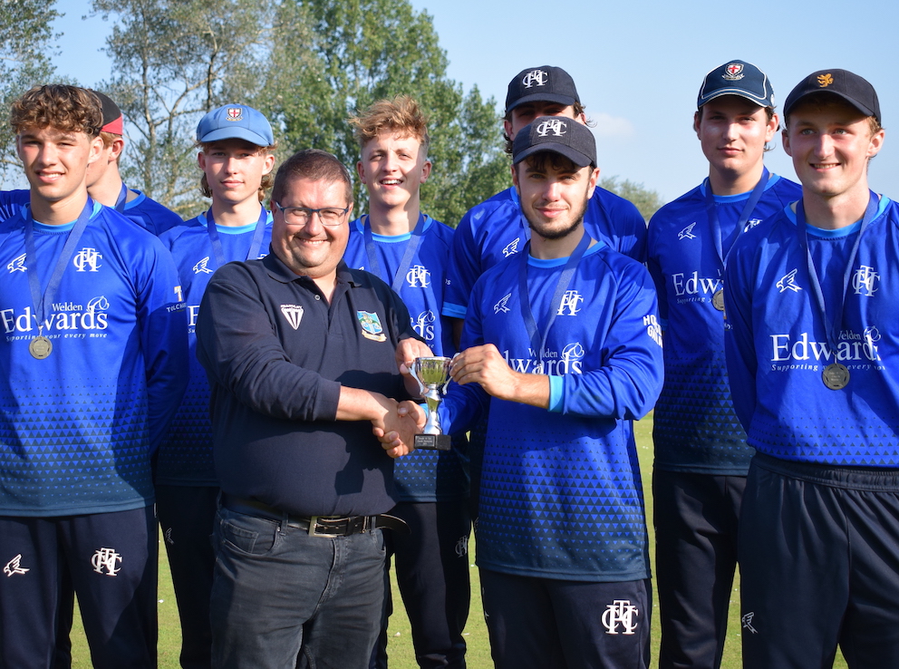 DCB chairman John Sparkes (left) hands the Devon U19 T20 Cup to Heathcoat captain Joe Du'Gay<br>credit: All photos by Conrad Sutcliffe