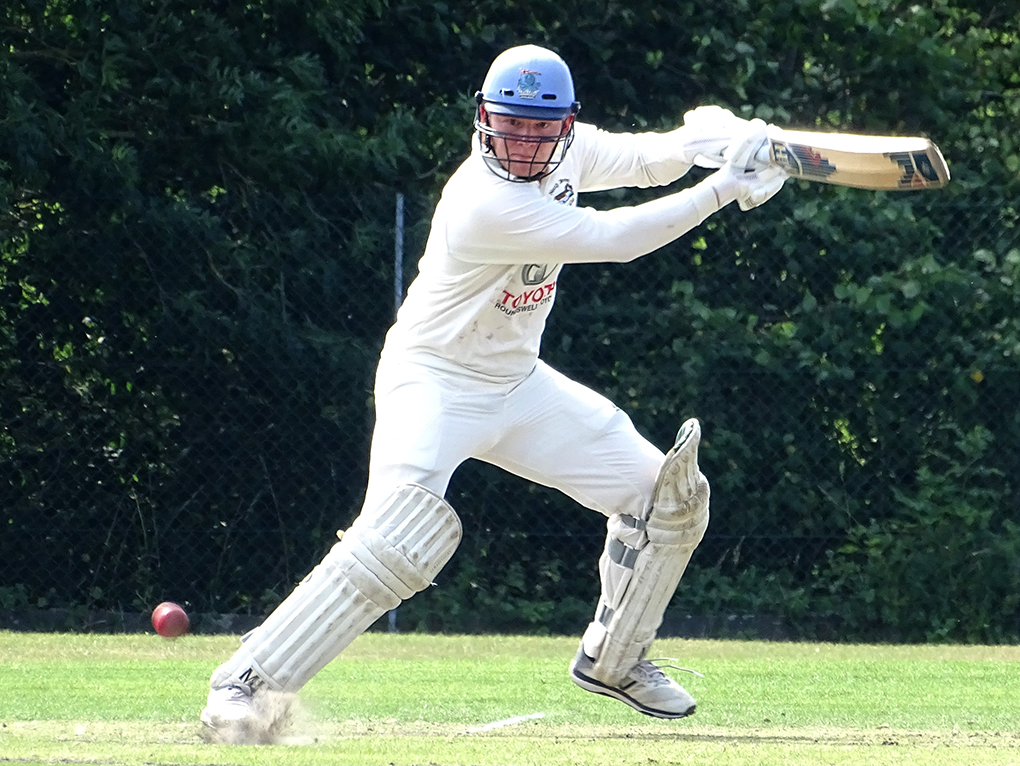 North Devon's Ben Howe hits a boundary in his side's win at Exeter<br>credit: Fiona Tyson
