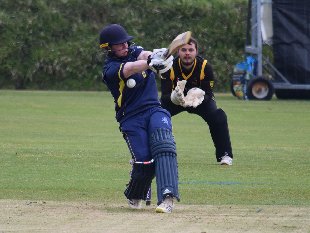 OUCH! Devon opener Jamie Baird is pinned on the elbow by Cornwall paceman Tom Dinnis in Sunday's T20 double-header at Werrington<br>credit: Conrad Sutcliffe