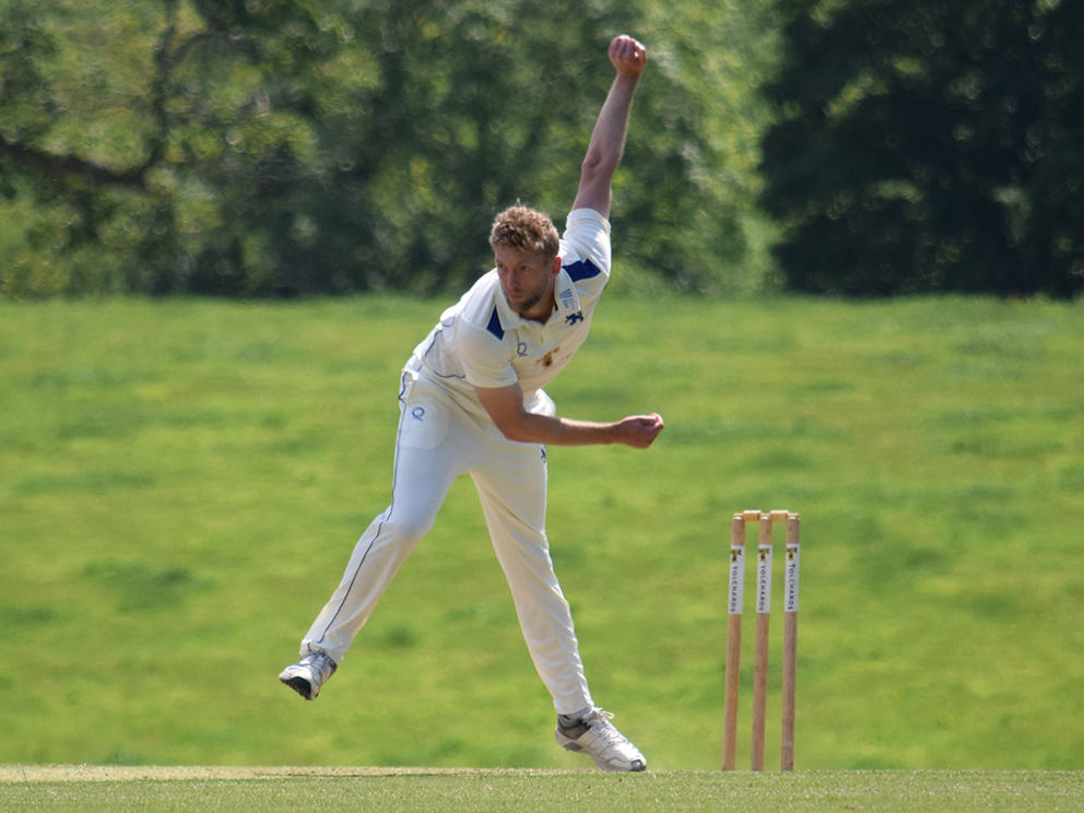 Calum Haggett hurls down a delivery during his lively first spell in the game against Cornwall at Sandford<br>credit: Conrad Sutcliffe