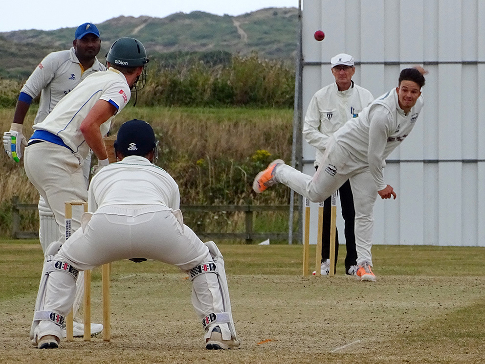 Darren Butler bowling for North Devon against Sandford – he took three wickets<br>credit: Fiona Tyson