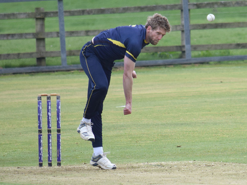 Calum Haggett on the way to a three-wicket haul for Devon against Cornwall at Werrington<br>credit: Conradcopy Ltd
