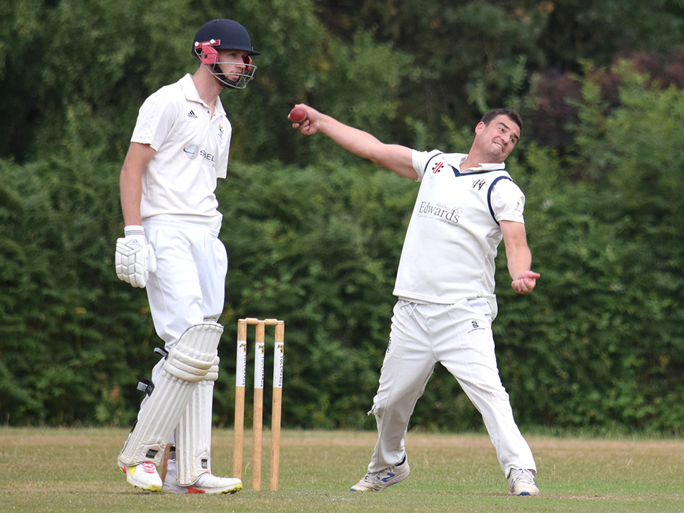 Jack Menheneott on the way to a four-wicket haul for Heathcoat against Bovey Tracey. The batsman is Seb Ansley, who top scored for Bovey with 32