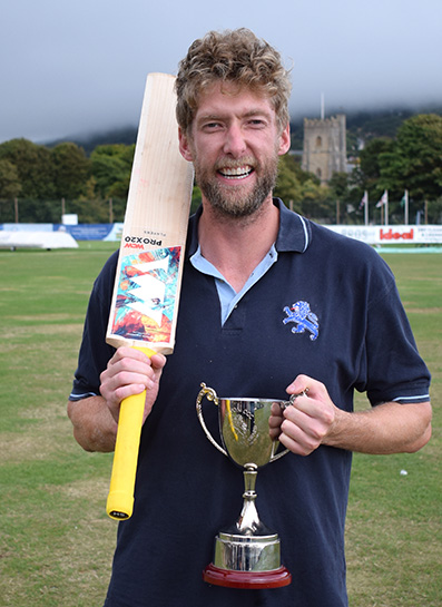 Calum Haggett with the Geoff Evans Cup awarded to the player of the season. He averaged more than 70 with the bat in three-day cricket and took 10 wickets at less than 17 runs each
