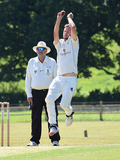 Hugo Whitlock leaps into his delivery stride 
