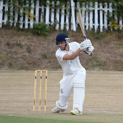 Brixham's Rhys Dallow batting against Plymstock