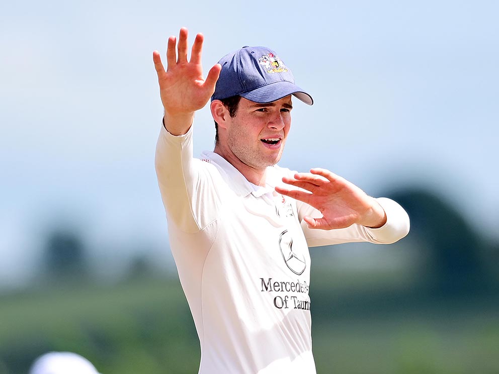 Exeter's young skipper Ed Middleton directing operations in the defeat by Bradninch<br>credit: Tom Sandberg / @ppauk