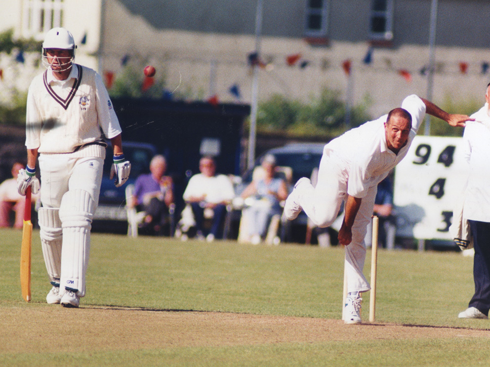 Keith Donohue bowling for Devon against Surrey at Bovey Tracey in the 1998 MCCA Cup semi-final. Devon won and went on to defeat Shropshire in the final at Lord's