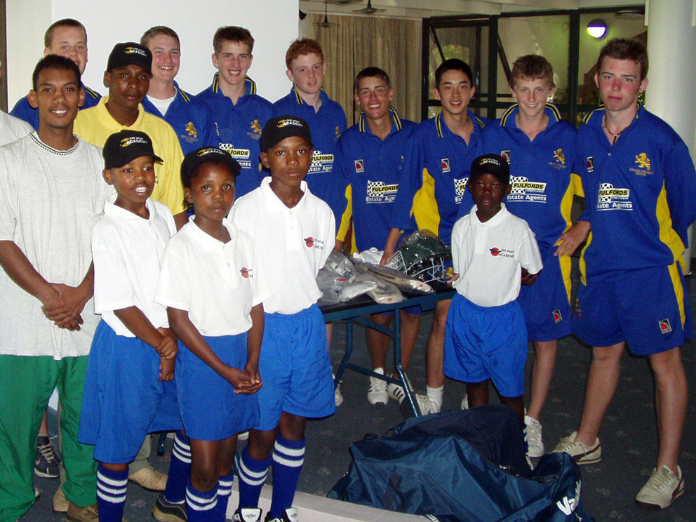 FLASHBACK: Devon's 2003 squad during a township social evening in Johnannesburg. Matt Cooke is on the farl left of the photo<br>credit: Jon Mears