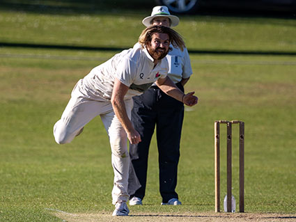 Andy Buzza bowling for Exmouth last Saturday in their win over Bovey Tracey<br>credit: All photos courtesy of Mark Lockett