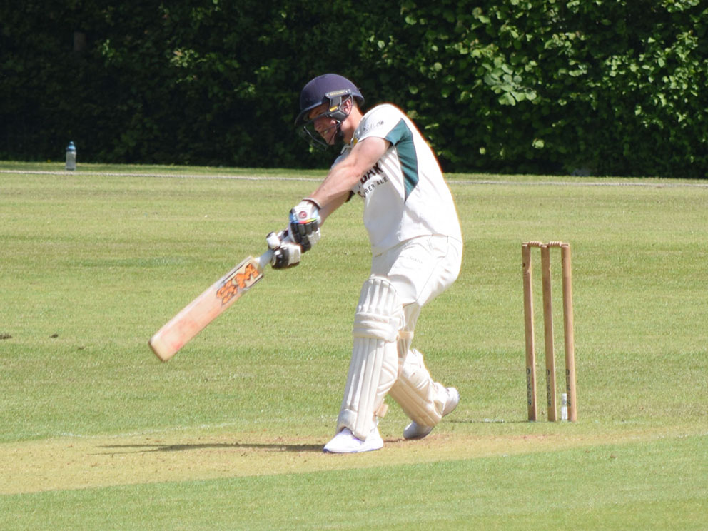 Budleigh skipper Lloyd Murrin hitting out in the win at Abbotskerswell last Saturday<br>credit: Conrad Sutcliffe - no re-use without copyright owner's consent