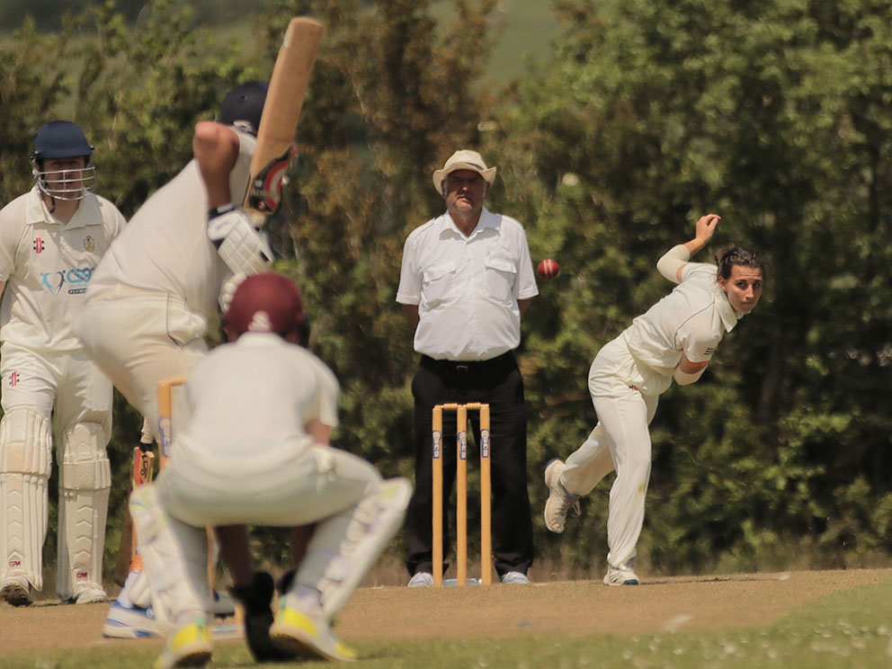 Bovey Tracey's Shawna Ball on the way to a two-wicket return in the game against Plymouth CS&R <br>credit: Alan Stewart