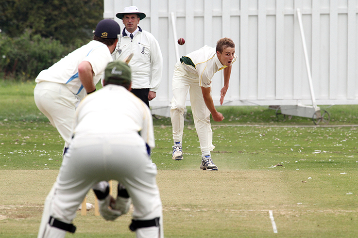 Charlie Morris bowling for Budleigh Salterton before he joined Worcestershire in 2012