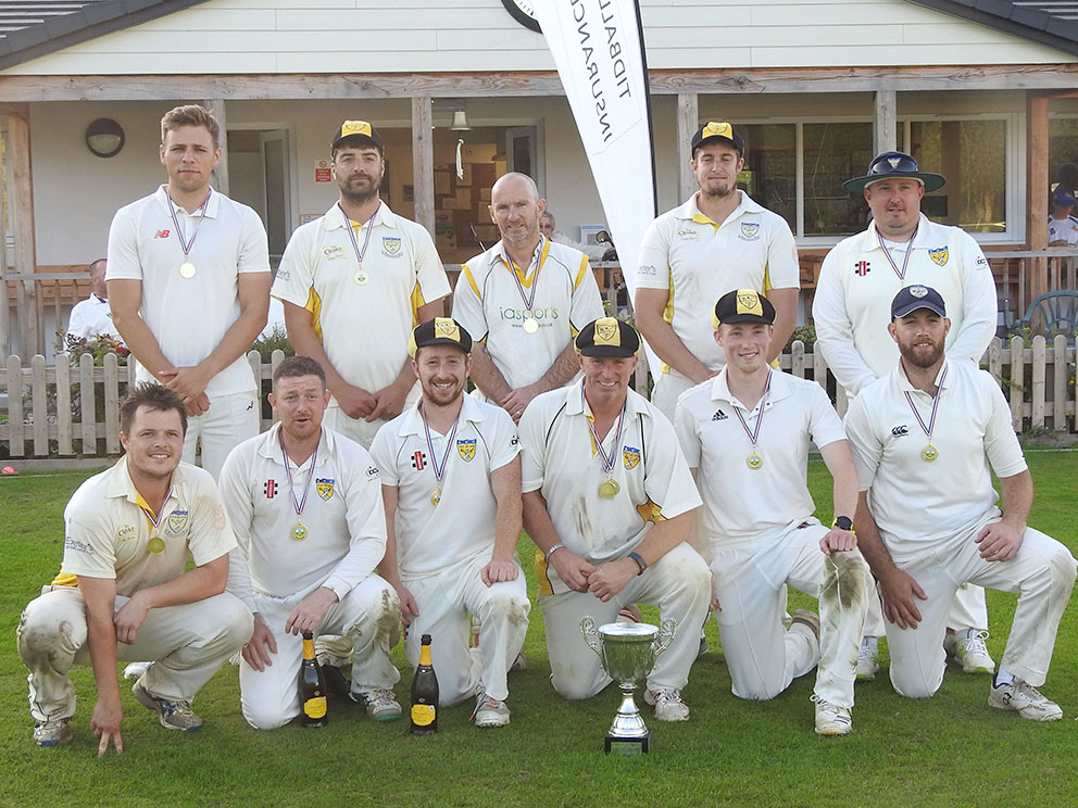 The winning Lustleigh team with the Tidball Insurance Services Cup<br>credit: Sue Tidball