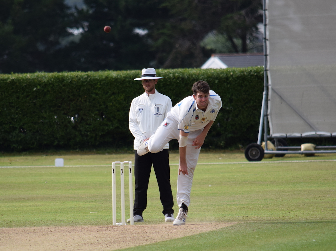 Ed Middleton on the way to a three-wicket haul against Cornwall<br>credit: Conrad Sutcliffe - no re-use without copyright owner's consent