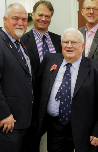 Geoff Evans (right) at a cricket dinner with former England captain Mike Gatting