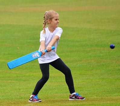 Esmee Stock, aged 9, showing her batting skills at the Ipplepen Festival