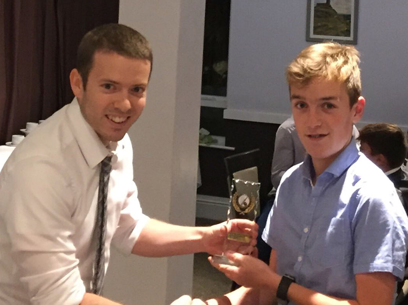 Ashburton 2nd XI captain Chris Yeo presents Jake Pascoe with the team's batting award for 2018 - see story below