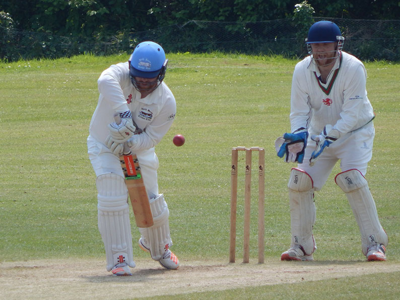 Dan Bowser batting for North Devon against Bradninch - the keeper is Tim Piper<br>credit: Stephen Birley