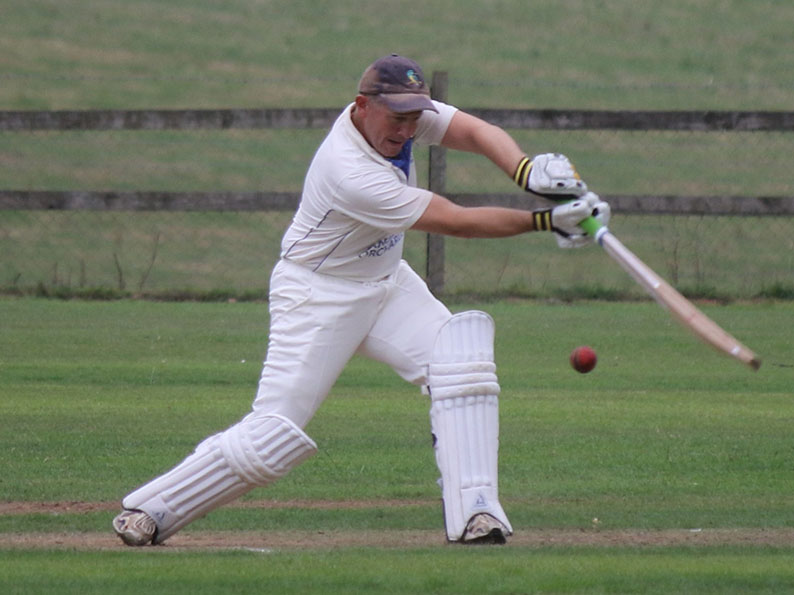 Adrian Small about to hit the winning runs for Sandford against his old club Exmouth<br>credit: Gerry Hunt