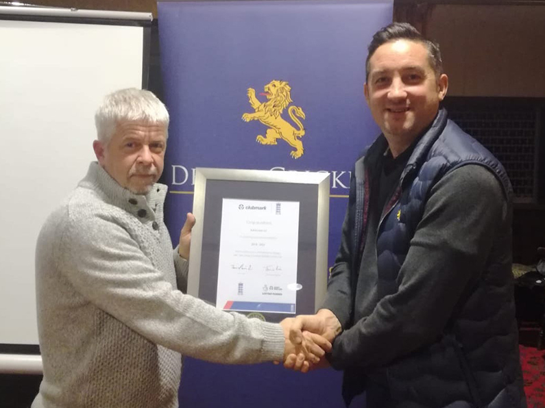 Ashburton chairman Jerry Crouch (left) is pictured receiving the ClubMark award from Matthew Theedom of the DCB
