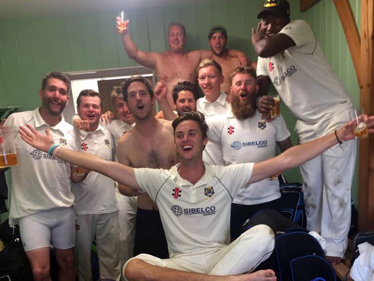Matt Golding leads the celebrations in Bovey's dressing room after the win over Heathcoat that clinched the Premier title