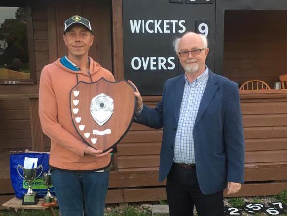 Andy Cork of Newton St Cyres with the League shield, presented by Andy Davis of sponsors Ashgrove Kitchens