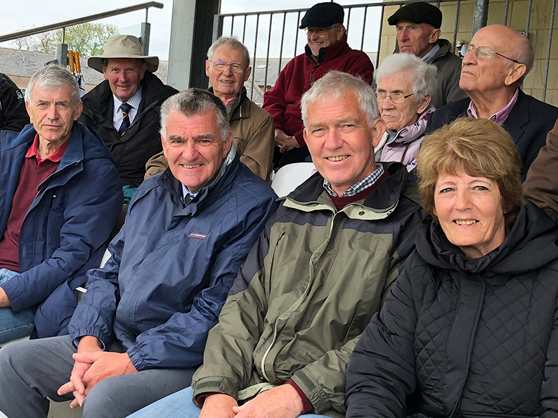 Devon secretary Nigel Mountford surrounded by county members in the Somerset Pavilion Stand