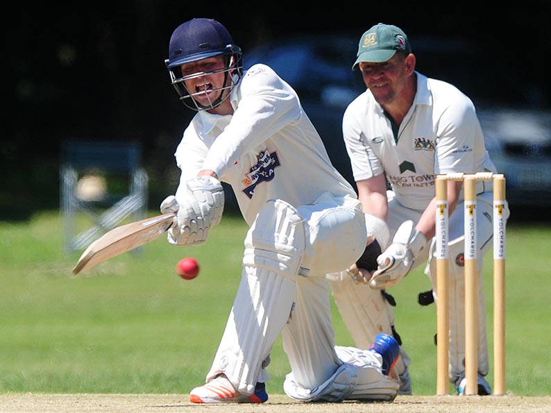 Torquay captain George Allen - in the runs against Abbotskerswell
