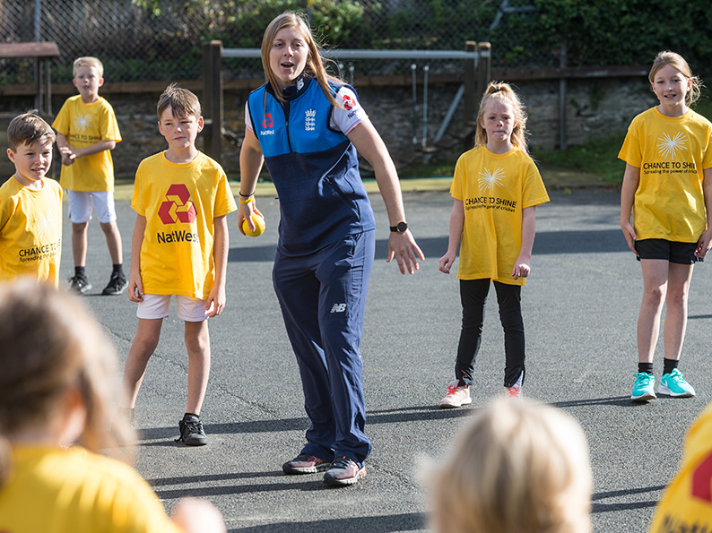 Heather Knight running a training session at her old school<br>credit: Photos: Paul Slater