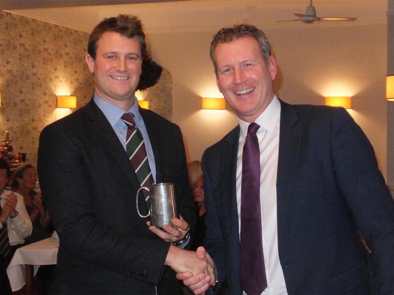 Liam Lewis collecting his 1st XI batting award from Jay Thorne of sponsors Harrison Lavers and Potburys