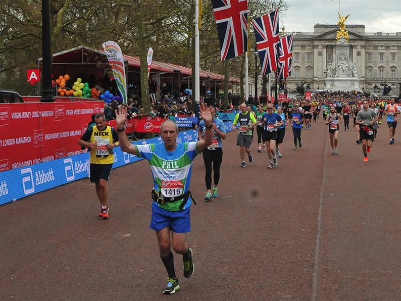 Last leg! Phil Bees running down the Mall during his 2016 Virgin London Marathon