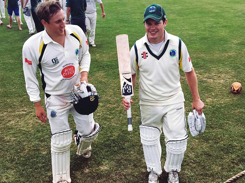 Ashley Harvey and Lloyd White on their way off after seeing Ashburton to victory over Shaldon