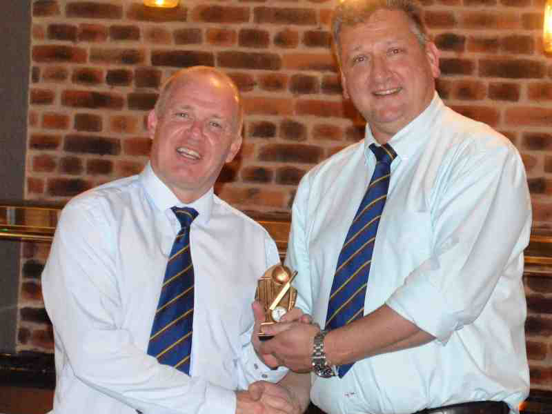 Matt Quartley (right) presents Paul Sutton with Ipplepen CC's 3rd XI player of the year award at the club's annual dinner