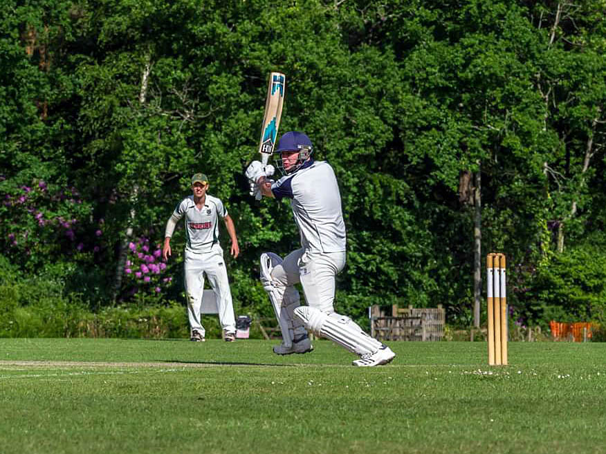 Ryan Dennis on his way to 58 for Bridestowe against Bovey Tracey