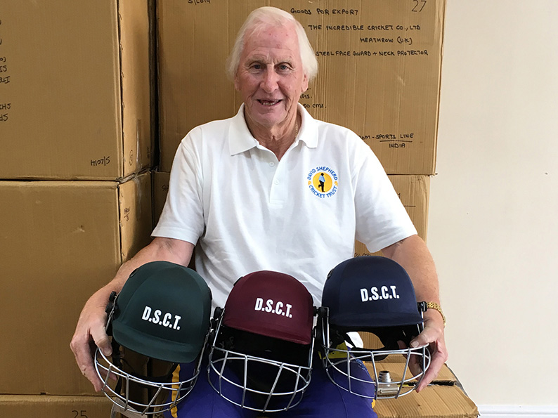 DSCT trustee Stuart Munday with some of the helmets being offered by the Trust to youth sections