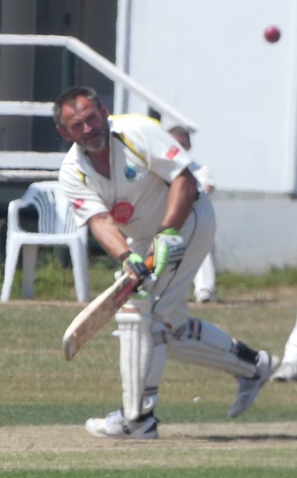 Tony Lacey battling it out for Ashburton against Shaldon