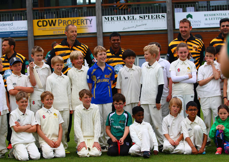 Lashings All Stars mingle with youngsters during the game at Mount Wise earlier this year - photo: Chris Cottrell