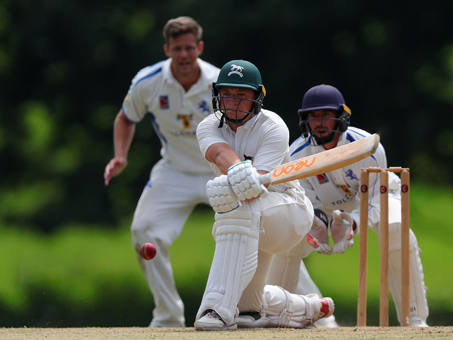 Wiltshire's Jake Goodwin plays the reverse sweep in front of Devon keeper Alex Barrow and slip fielder Wayne White | Photo: Phil Mingo https://www.ppauk.com/event/Devon-CCC-v-Wiltshire-CCC-Sandford-UK-23-Jul-2018/<br>credit: https://www.ppauk.com/photo/2138908/