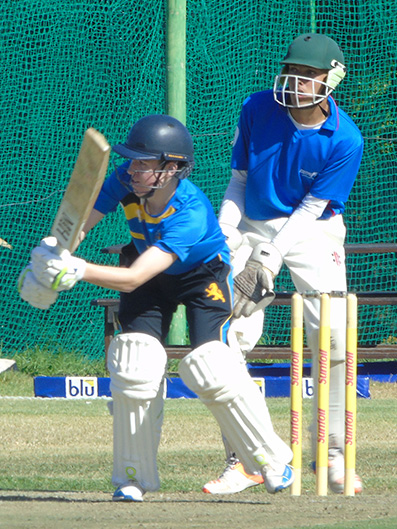 Jake Pascoe on his way to a half century for Devon in the day-night game against Bergvlient High School 