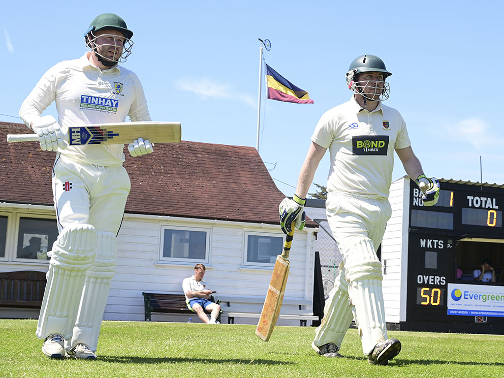 Tavistock openers Dave Ball (left) and Harry Geering on the way out to bat against Seaton last season<br>credit: @ppauk 