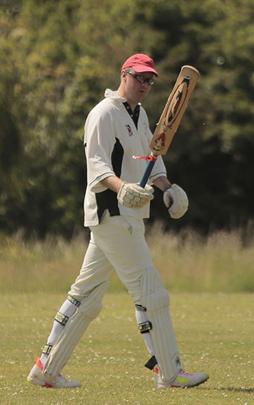 Civil's Alex Dunlavey reacts to reaching his century against Bovey