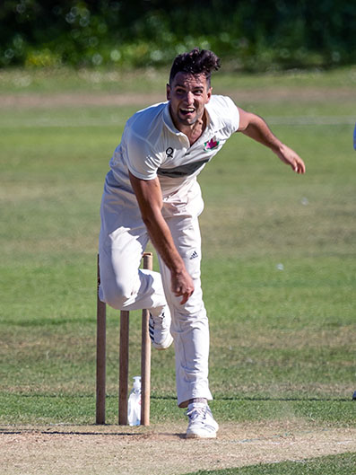 Pete Turnbull bowling from the Football Stand end for Exmouth against Bovey Tracey last Saturday