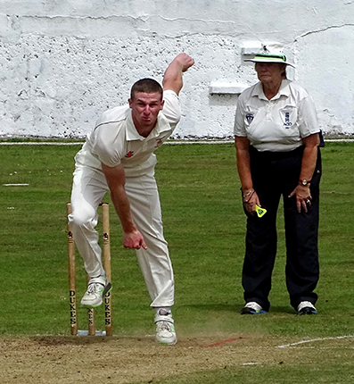 Dan Fogerty in the middle of his gruelling nine-over spell against North Devon | Photo: Fiona Tyson