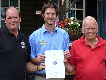 Joe Clowes (right) receiving an award from the Devon Cricket Board during his spell as Abbotskerswell CC chairman. Also pictured are Chris Kelmere (left) and Andy Fairbairn from the DCB.