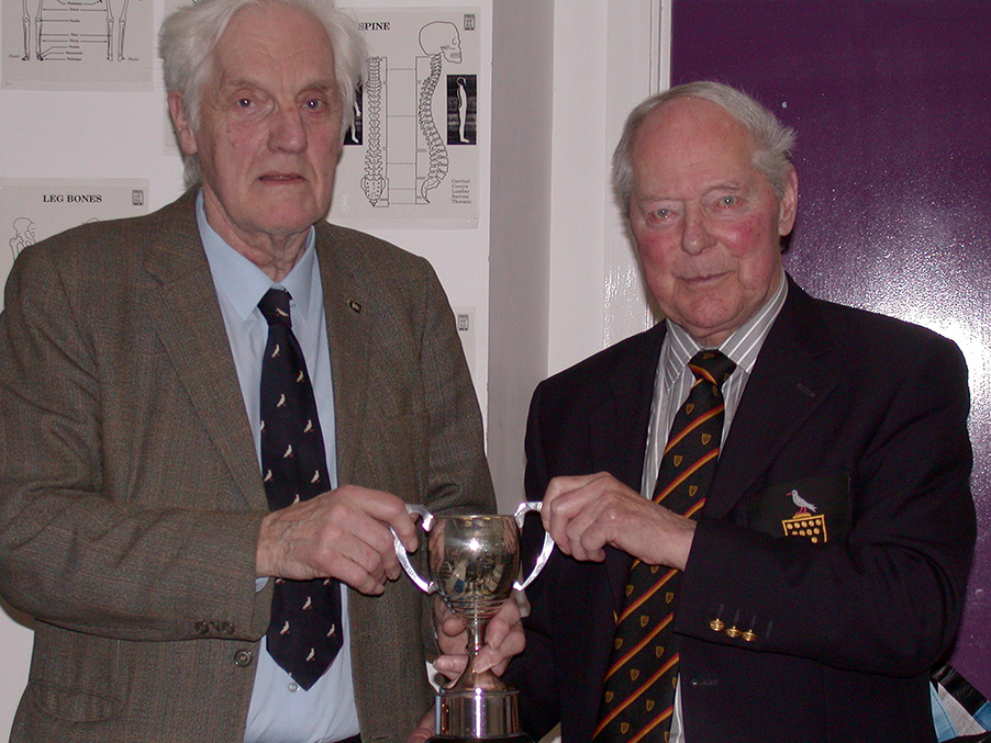 Colonel Ronnie Potts (right), at the time president of Cornwall CCC, presents the Arthur Lugg Cup to Geoff Husband in recognition of more than 40 yearsâ€™ service to the club<br>credit: Michael Weeks / Cornwall Cricket
