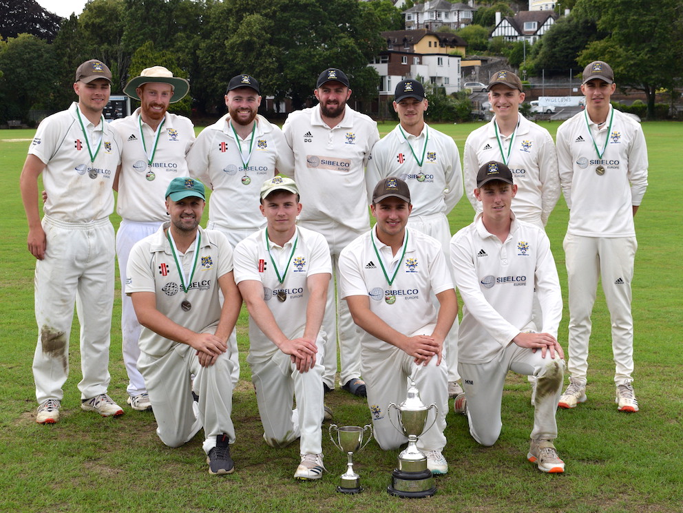 The victorious Bovey Tracey 2nd XI with their silverware after defeating Ipplepen in the Aaron Printers Cup final at South Devon CC